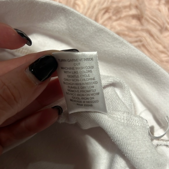 Size large slouchy white seater with fierce on the front - Picture 7 of 7